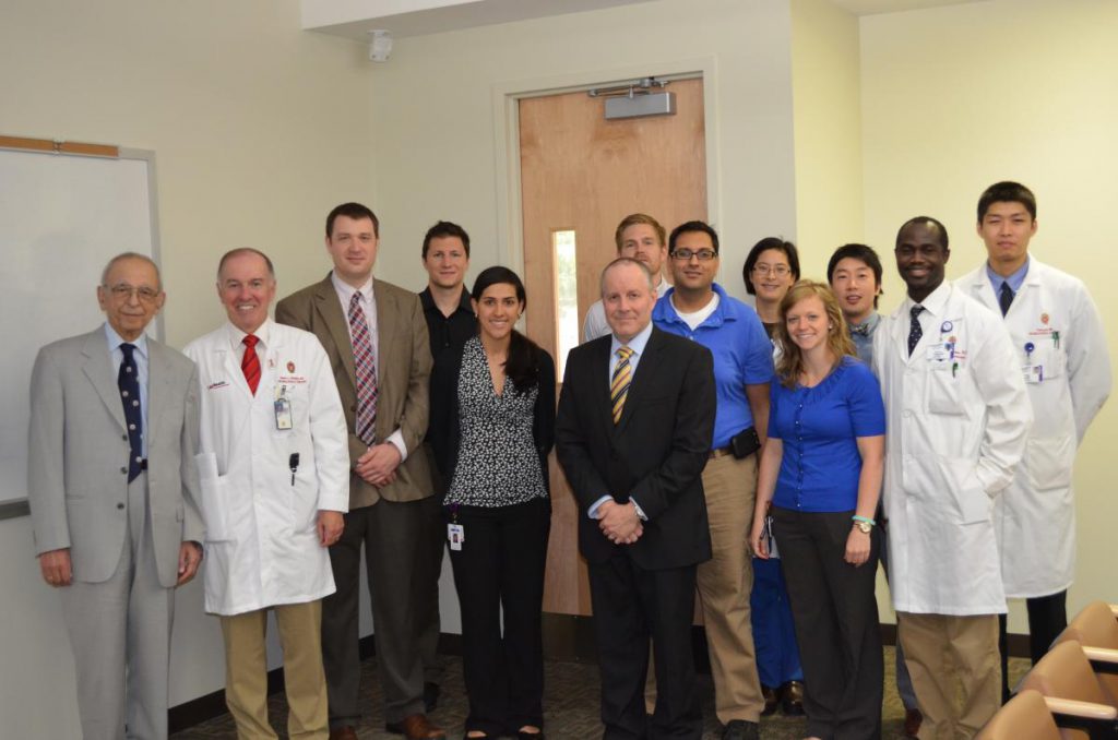 Conferences include the Distinguished Lecturer Series, where world–renowned educators, such as Peter Rasmussen, M.D. (middle), meet and exchange ideas with residents.