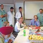 Dr. Chopp at lunch with residents and research staff