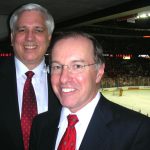 Dr. Ondra and Dr. Dempsey at UW Hockey game