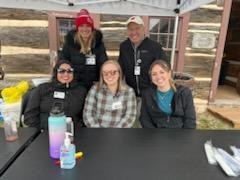 Dr. Robert Dempsey greets attendees at the Oneida cultural center along with Health Coach Amanda Riesenberg and her team.