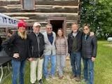 Coach Amanda Riesenberg, Dr. Robert Dempsey, and local Oneida members joke about the intersections between modern medicine and traditional ways.